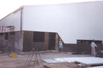 Cladding being attached to the building
