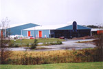 Architecturally fronted steel factory building. Used for the manufacture of windows and glazing